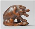 A large boxwood netsuke of a hungry wolf. Early 19th century - image-4