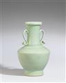 A celadon-glazed vase with handles. 19th/20th century - image-1