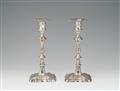 A pair of George II silver candlesticks - image-1