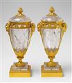 A rare pair of rock crystal potpourri vases in the manner of Pierre Gouthière - image-1