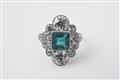 An Art Deco platinum and emerald ring - image-1