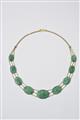 An 18k gold and carved jade collier - image-1