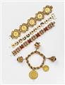A gold charm bracelet with a Cologne gold coin - image-2