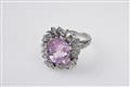 A platinum and pink sapphire cluster ring - image-1