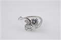 A platinum and diamond toi-et-moi ring - image-1