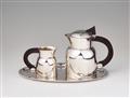 A Puiforcat silver mocca pot and cream jug - image-1