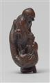 A wood netsuke of a sennin with a dragon. First half 19th century - image-2