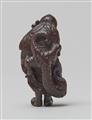 A wood netsuke of a sennin with a dragon. First half 19th century - image-3