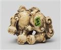 A very fine Kyoto school ivory netsuke of a lively shishi and cub. Early 19th century - image-5