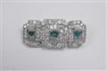 An Art Deco platinum and emerald brooch - image-1