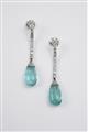 A pair of platinum and emerald earrings - image-1
