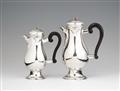 A pair of Augsburg silver pitchers - image-1