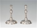 A pair of rococo Hamburg silver candlesticks - image-1