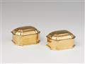 A pair of Magdeburg silver-gilt toilette boxes - image-1