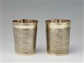 A pair of Nuremberg silver gilt snakeskin beakers - image-1