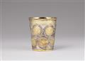 An early Berlin parcel-gilt silver coin-set beaker - image-1