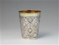 A parcel gilt silver coin set beaker - image-1