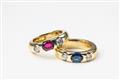 A pair of 14k gold rings with coloured stones - image-1