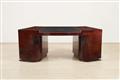 A curved office desk by a follower of Jacques Adnet - image-1