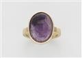 A 14k gold ring with an amethyst cameo - image-1
