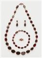 A 14k red gold and garnet demi-parure - image-1