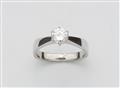 A 14k white gold ring with a brilliant-cut diamond solitaire - image-1