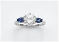 An 18k white gold, sapphire, and diamond ring - image-1