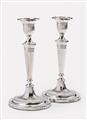 A pair of George III silver candlesticks - image-1