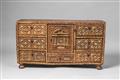 A Spanish carved walnut sideboard - image-1