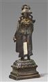 A rare Kashmiri or Western Tibetan silver-inlaid dark bronze figure of the crowned Buddha. 9th/10th century - image-2