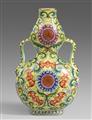 A yellow ground famille rose double-gourd vase. 20th century - image-1