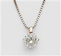 An 18k white gold diamond solitaire pendant. - image-1