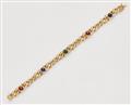 An 18k gold and coloured gemstone bracelet - image-2