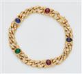 An 18k gold and coloured gemstone bracelet - image-1