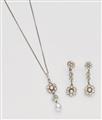 An 18k white gold, diamond and Oriental pearl pendant and earrings - image-1