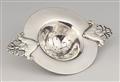 A silver tea strainer by Georg Jensen, model no. 117 - image-1