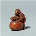 A boxwood netsuke of oni with a sack, by Minsai. Around 1830 - image-2