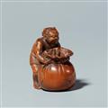 A boxwood netsuke of oni with a sack, by Minsai. Around 1830 - image-1