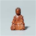 A boxwood netsuke of a lady seated on a stool. Mid-19th century - image-1