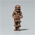 A Shûzan-style wood and lacquer netsuke of a standing fisherman. 18th century - image-1