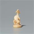 A walrus tooth netsuke of a dog on an oval base. Second half 19th century - image-4