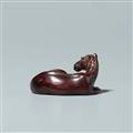 A tagayasan wood netsuke of a reclining horse. Probably last third 19th century - image-2