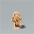 An ivory netsuke of a horse on an oval base. Late 19th century - image-2