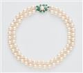 An 18k white gold pearl necklace and earrings - image-2