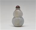 A light grey jade snuff bottle. - image-1