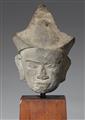 A Baphuon sandstone head. Cambodia. 11th century - image-1