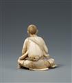 An ivory okimono of a man grinding small leaves. Late 19th century - image-2