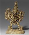 A Nepalese gilt bronze figure of Yamantaka Vajrabhairava in yab-yum. 18th century - image-1