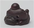 A wooden ashtray netsuke of Hotei. 19th century
 - image-2