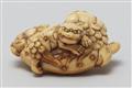 An ivory netsuke of a shishi with cub. 18th century - image-3